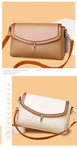 Detailed view of the stylish leather crossbody bag featuring elegant turn-lock closure.