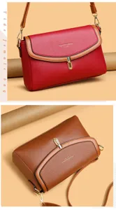 Detail view of stylish women leather crossbody bag with metal lock and adjustable strap.