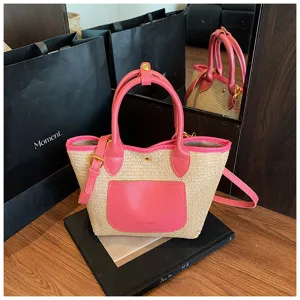Stylish straw woven shoulder crossbody bag with pink leather trim and top handle for women