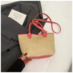 Straw woven bucket bag with pink trim, stylish shoulder handbag for daily work commute.