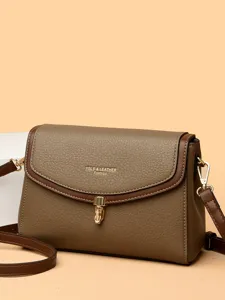 Women leather shoulder bag casual crossbody messenger bag with metal lock clasp fashion main view