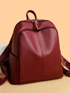 Stylish leather backpack for women, casual soft PU rucksack with large capacity.