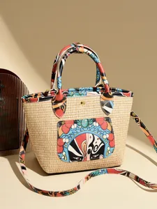 Straw bucket bag for women trendy shoulder crossbody handbag with unique artistic opera mask print
