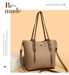 Detailed view of the stylish women shoulder tote bag with double handles and shoulder strap.