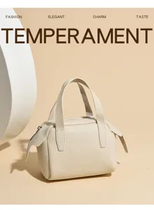 Donna borsa a mano in pelle beige chic boston shopper minimalista per lavoro quotidiano.