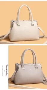 Elegant women's frame crossbody bag with large capacity, stylish leather handbag for daily use.