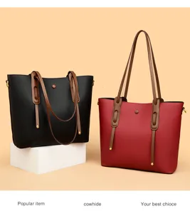 Detailed view of large capacity leather tote bag, minimalist style single shoulder design.