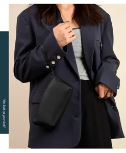 Sac pochette en cuir veritable pour femme, porte-monnaie noir elegant pour telephone et cartes.