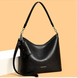 Black leather hobo shoulder bag for women, large capacity daily commuting crossbody bag.