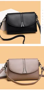 Elegant women's shoulder crossbody bag with textured leather and chic metal clasp.