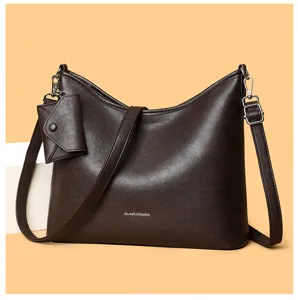 Detailed view of the stylish brown leather shoulder bag with spacious interior and hardware.