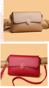 Close-up detail of stylish women's shoulder bag with metallic lock closure and premium leather.