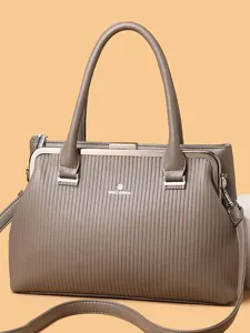 Stylish taupe kiss-lock handbag for women, large capacity daily shoulder and tote bag.