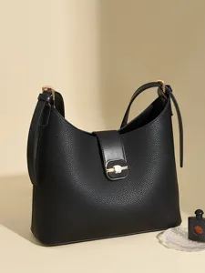 Minimalist leather bucket shoulder bag for women, stylish large capacity daily commuter handbag.