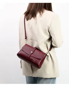 Detailed view of a stylish wine red leather shoulder bag for women, elegant daily casual.