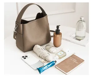 Large capacity soft leather bucket bag for women, stylish versatile shoulder crossbody bag.