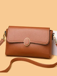 Brown leather crossbody bag for women, stylish small square shoulder bag for casual daily commute.