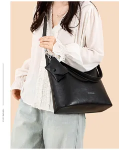 Minimalist black leather shoulder bag with small pouch, large capacity casual daily tote.