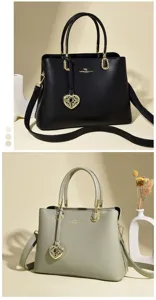 Vue détaillée du sac à main pour femme en cuir, élégantes garnitures dorées et pendentif cœur.