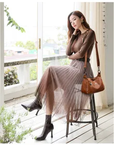 Women brown leather crossbody shoulder bag with adjustable wide strap casual commuting bag.