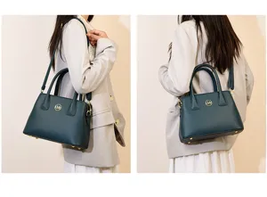 Detailed view of the dark green women leather tote bag showcasing shoulder wear and metal logo.