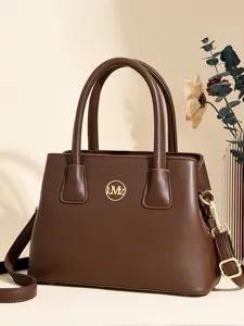 Stylish brown tote bag for women, classic handbag with top handles and shoulder strap.