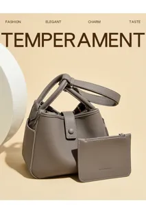 Sac seau en cuir souple gris avec pochette, sac bandoulière élégant pour femme de travail.