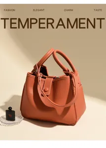 Sac seau en cuir souple effet litchi, élégant sac bandoulière pour femme active et chic.