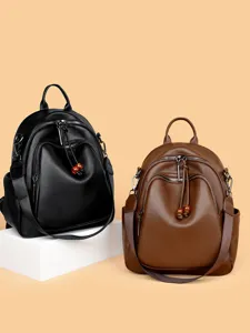 Women's soft leather backpack stylish casual large capacity travel school daypack bag.
