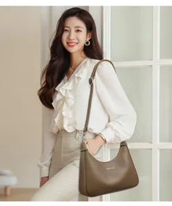 Elegant brown hobo shoulder bag for women, minimalist solid color design with metal hardware.