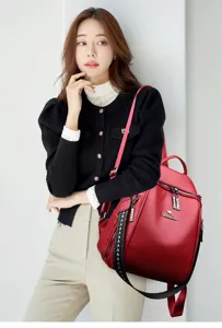 Elegante zaino da donna in pelle rossa, grande capacità per viaggi e tempo libero.