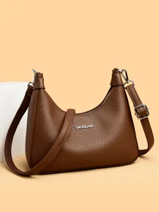 Stylish brown hobo shoulder bag for women, trendy solid color PU leather crossbody bag main view.