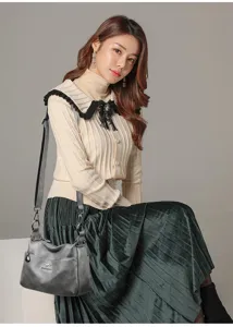 Stylish grey leather crossbody bag for women, large capacity and adjustable strap, daily use.