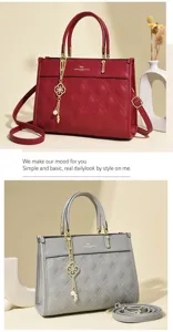 Detailed view of the stylish quilted leather tote bag with elegant chain pendant and dual handles.