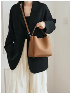 Large capacity soft leather bucket bag for women, versatile shoulder crossbody handbag.