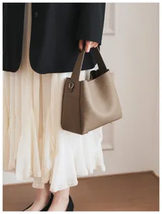 High-capacity soft pebbled leather bucket bag detailed view, elegant and versatile daily handbag.