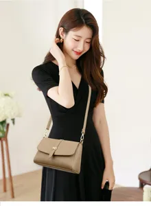 Elegant women's crossbody shoulder bag detail, minimalist design, premium PU leather.
