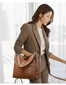 Elegant brown leather shoulder bag for women, stylish tote bag for daily commute and leisure.