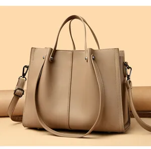 Detail view of women soft leather tote bag, elegant business commuting shoulder handbag.