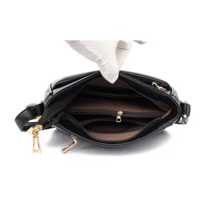 Black soft leather large capacity crossbody shoulder bag interior structure main view display