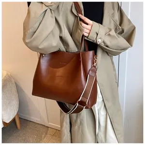 Stylish brown PU leather tote bag with contrast shoulder strap, large capacity commuter casual bag.