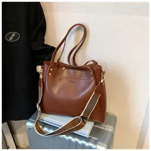 Brown PU leather tote bag with contrast shoulder strap, spacious everyday bucket bag.