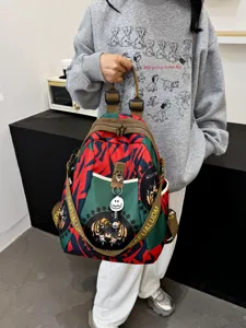 Stylish colorful nylon casual backpack for women with tiger print and straps, front view.
