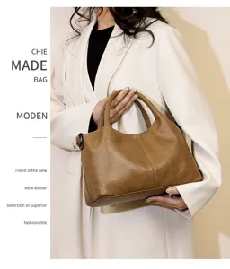 Detail view of the retro PU leather handbag showcasing fine stitching texture and durable handle.