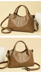 Detailed view of the retro brown commuter handbag showing fine leather texture and stitching.