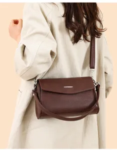 Detailed back view of a dark brown soft leather women's shoulder and crossbody bag.