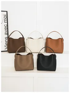 Large capacity soft leather bucket bag for women, versatile shoulder crossbody handbag.