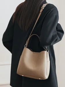 Large capacity soft leather bucket bag for women, stylish single shoulder crossbody handbag.
