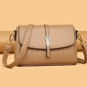 Stylish women PU leather crossbody shoulder bag with diamond quilted pattern and metal buckle.