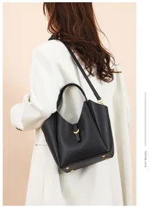 Black leather shoulder bag women chic tote bag top grain cowhide bucket bag detail view